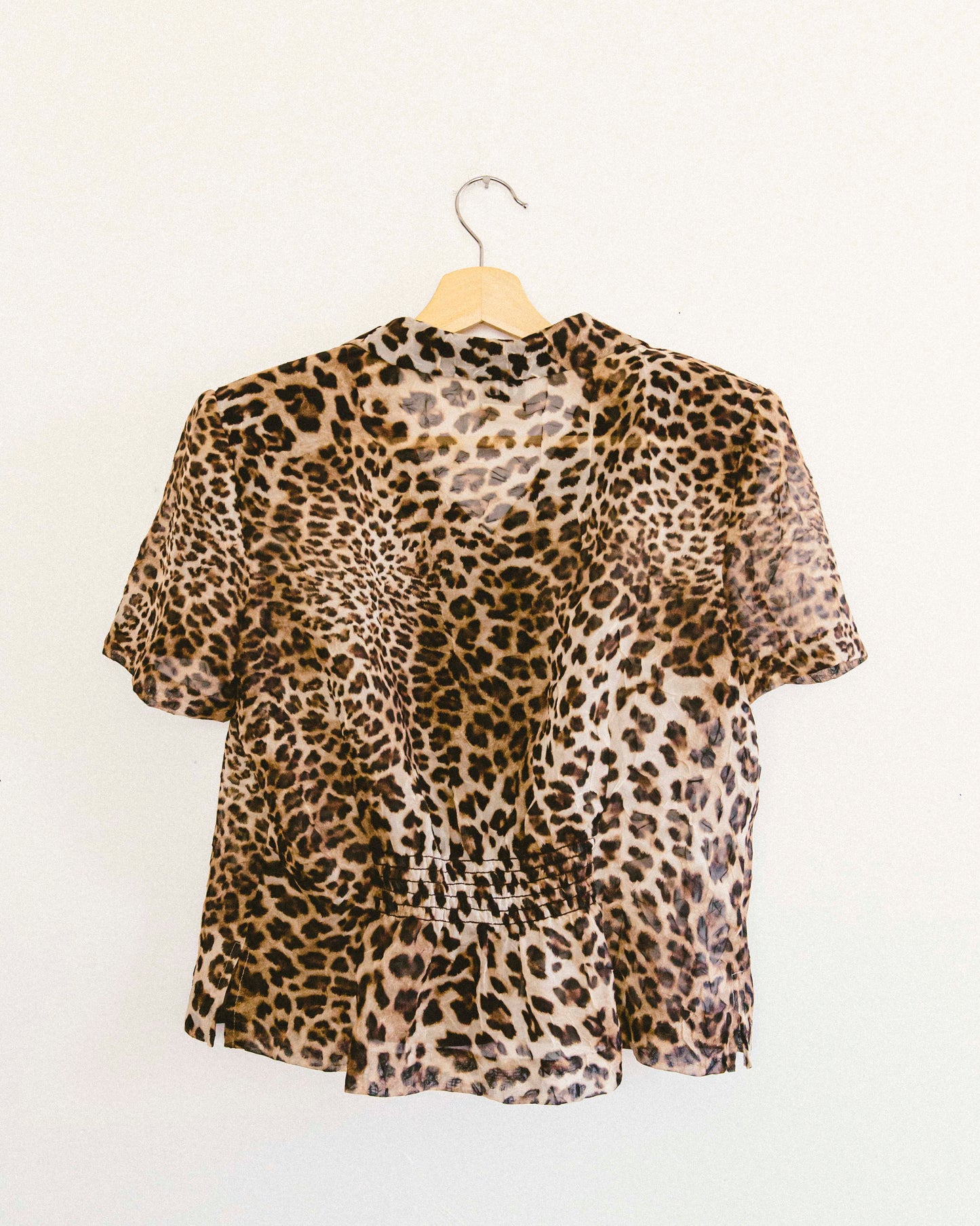 Blusa de leopardo transparente