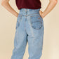 High Rise Mid Wash Chic Tapered Jeans